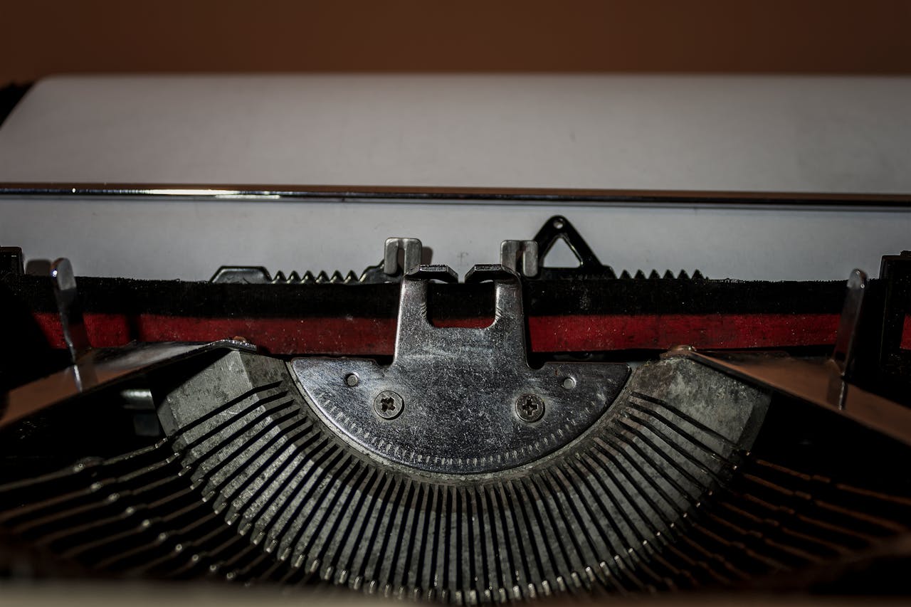 Close-up view of vintage typewriter parts highlighting the classic mechanical design.